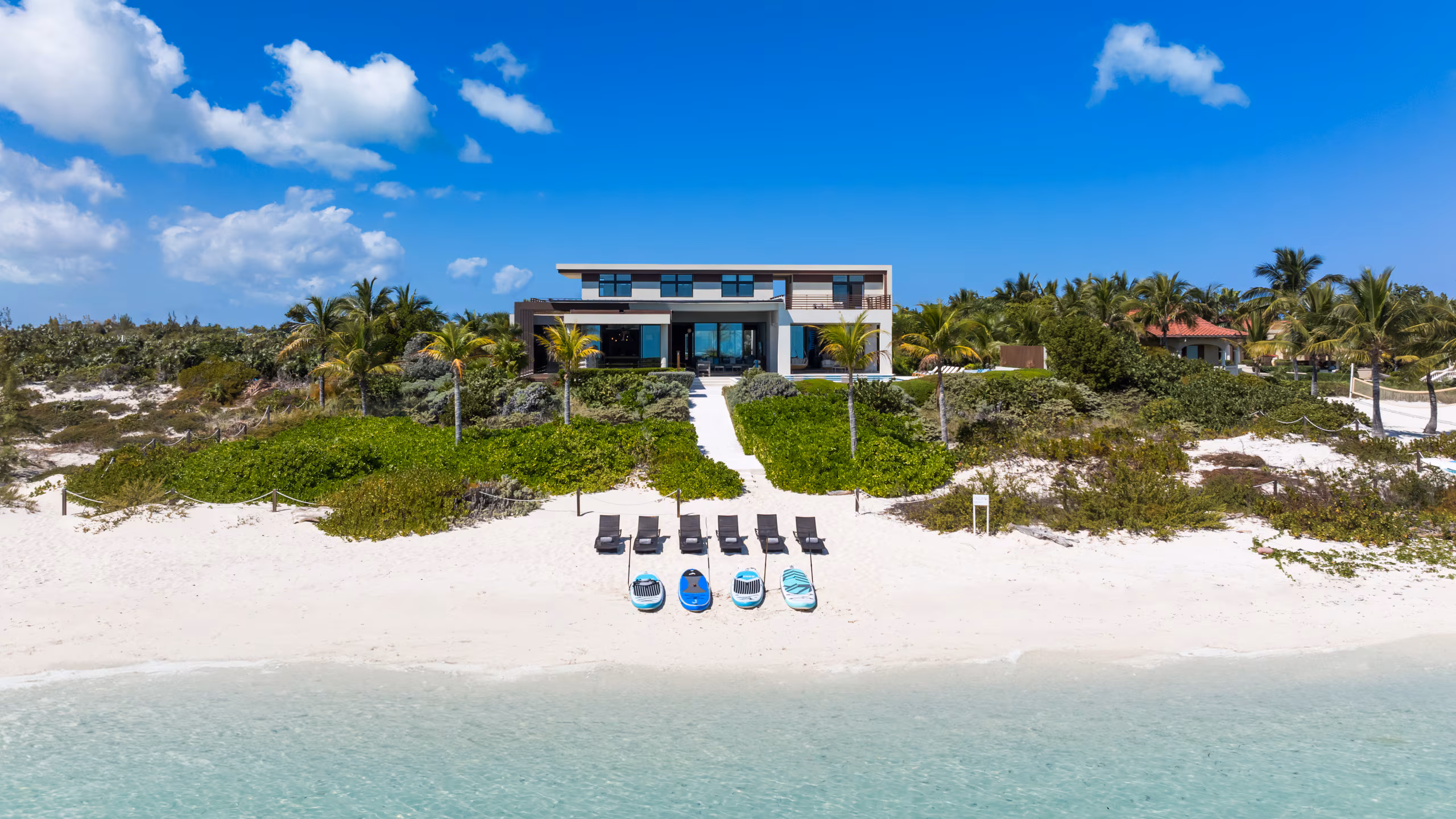 Beachfront luxury villa at midday